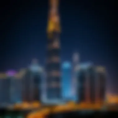 Night view of Albatha Tower illuminated against the backdrop of the city