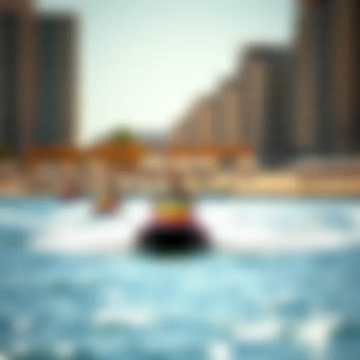 Visitors enjoying water sports at Yas Beach