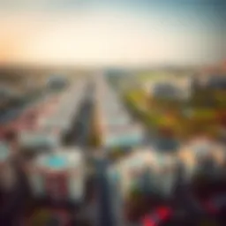 Aerial view of Jumeirah Village Circle showcasing residential buildings and green spaces