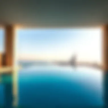 The stunning infinity pool at The One Palm Jumeirah with a view of the skyline